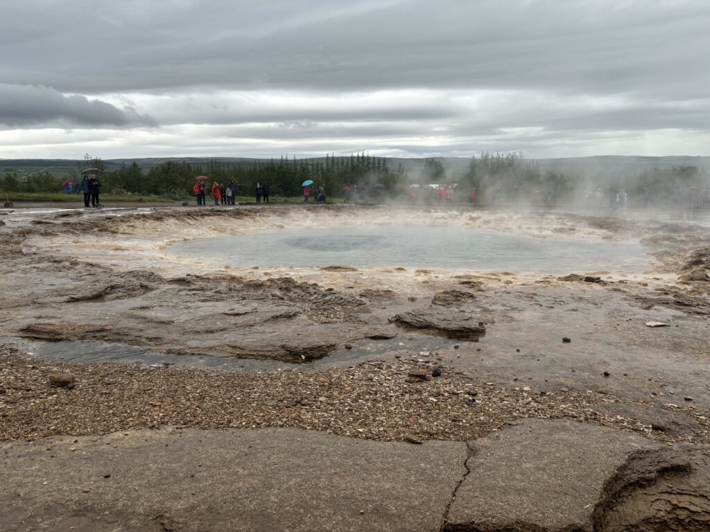 The original geysir, right before the pool of water becomes very exciting briefly.