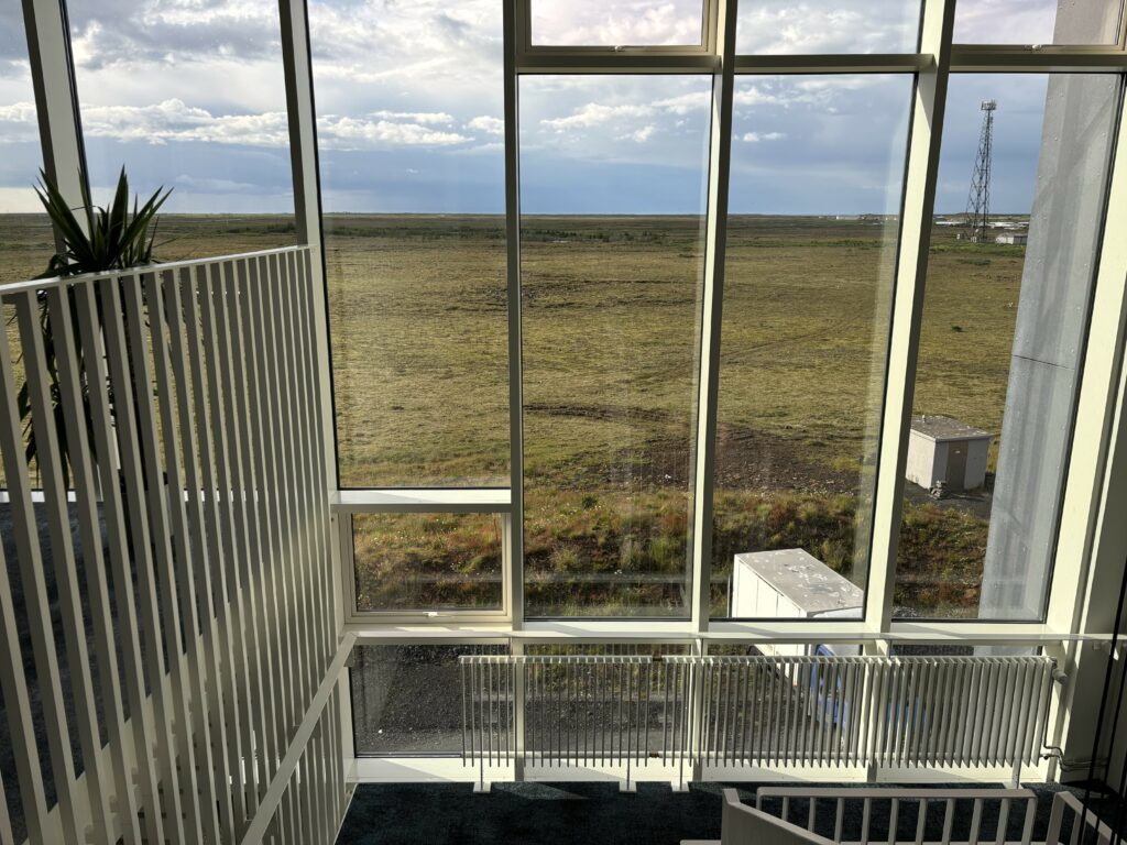 A bleak view of the keflavik landscape from a hotel window.